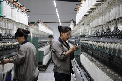 青冈志德亚麻纺织公司:“两头在外”的企业